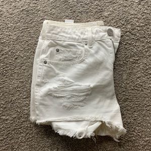 White distressed shorts